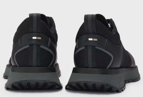 Mixed-material trainers with mesh details and branding